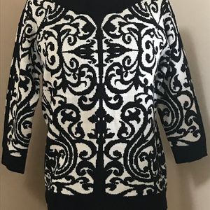 Soft sweater. 3/4 length sleeves.